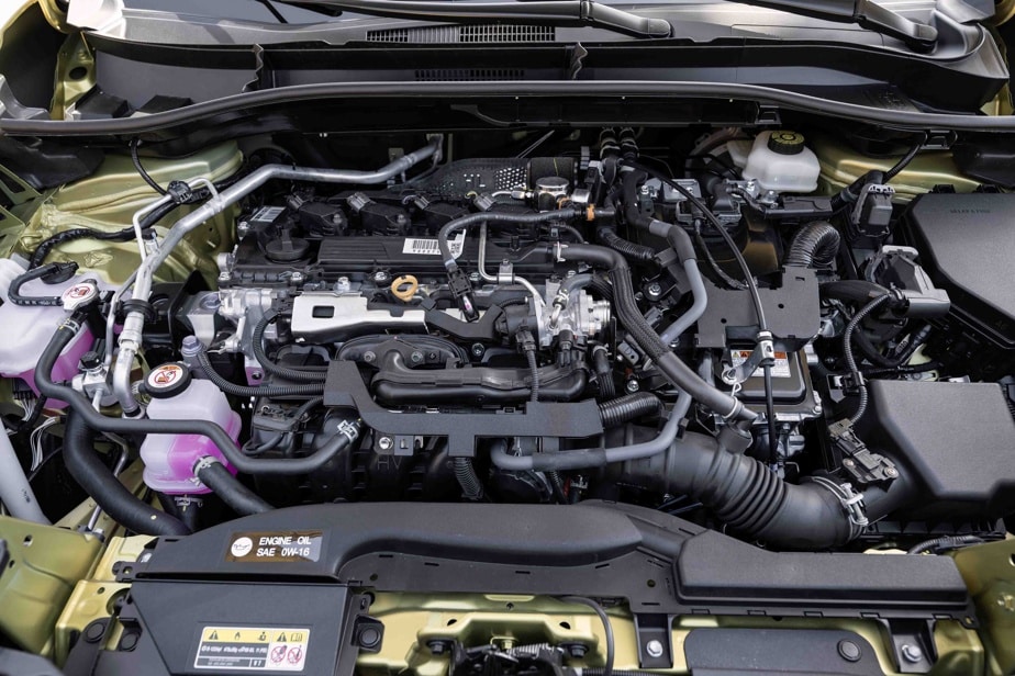 The hybrid engine here implies the presence of four engines.  One gasoline (2 L) and three electric, one of which is responsible for driving the rear axle. 