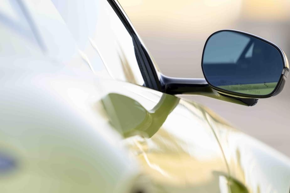 A rearview mirror of the Aston Martin Vantage